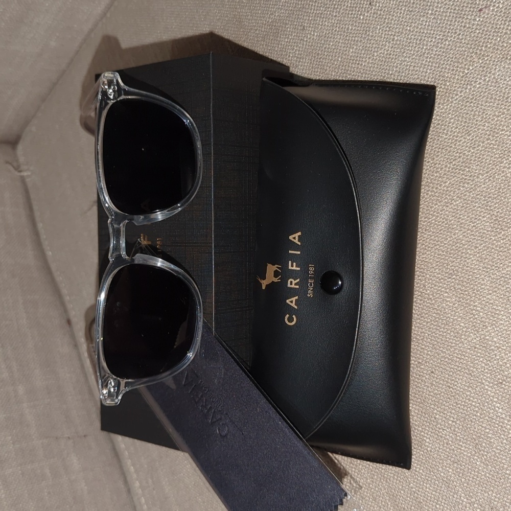 NIB (New in  Box) Carfia Polarized Sun Glasses.